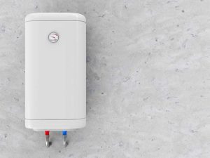 Tankless Water Heater vs Tank Heater. Tankless hot water heater mounted on wall.